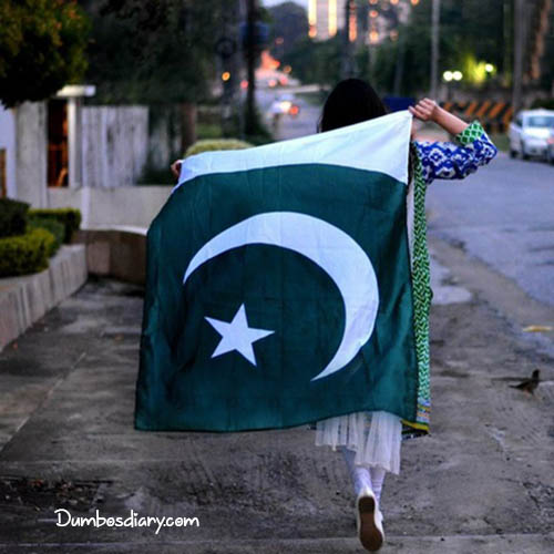 A girl running with Pakistani Flag