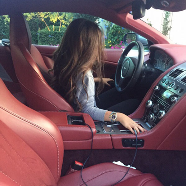Girl in luxury car