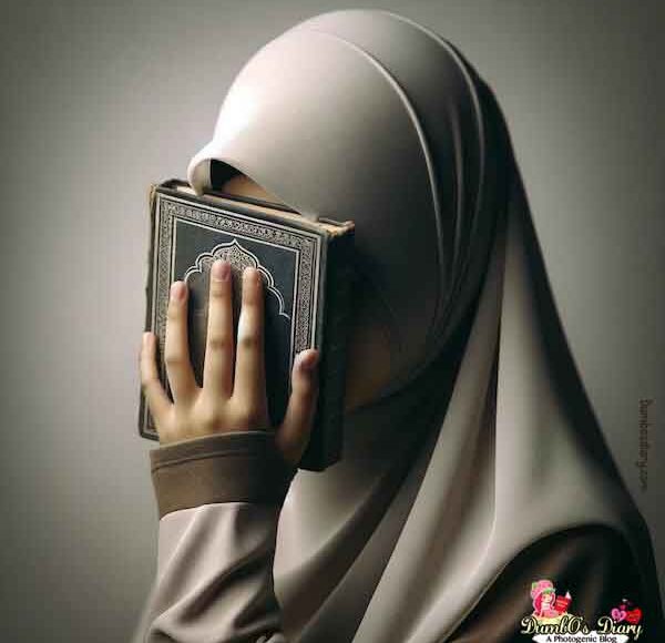 hijabi-girl-holding-Quran-dp